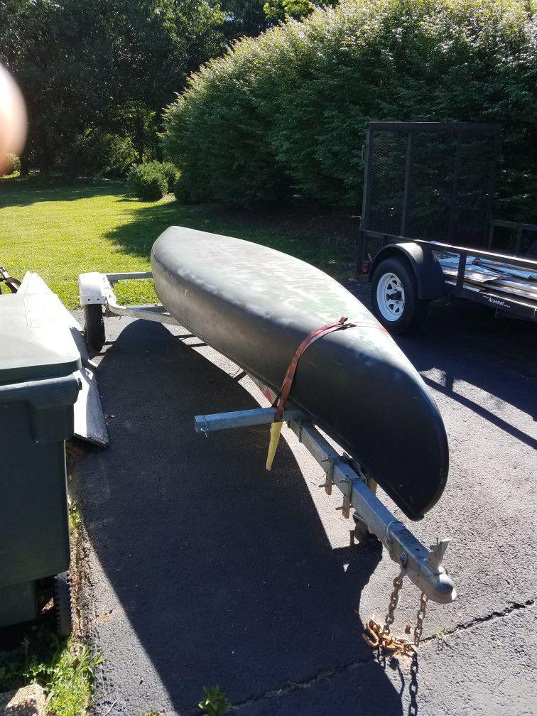 15 ft. Fiberglass canoe with trailer