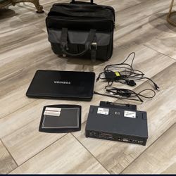 Toshiba Laptop with charger, Wilson Leather Business Bag, HP Docking Station, Mouse Pad.  