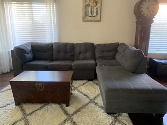 Grey Couch with Pull out bed & Storage Trunk