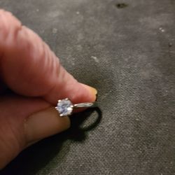 Size 6 silver ring with cubic zirconia stone. .

