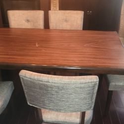 All Wood Dining Table And Cushioned Chairs