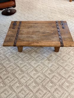 Rustic Wood Coffee Table with Iron Straps