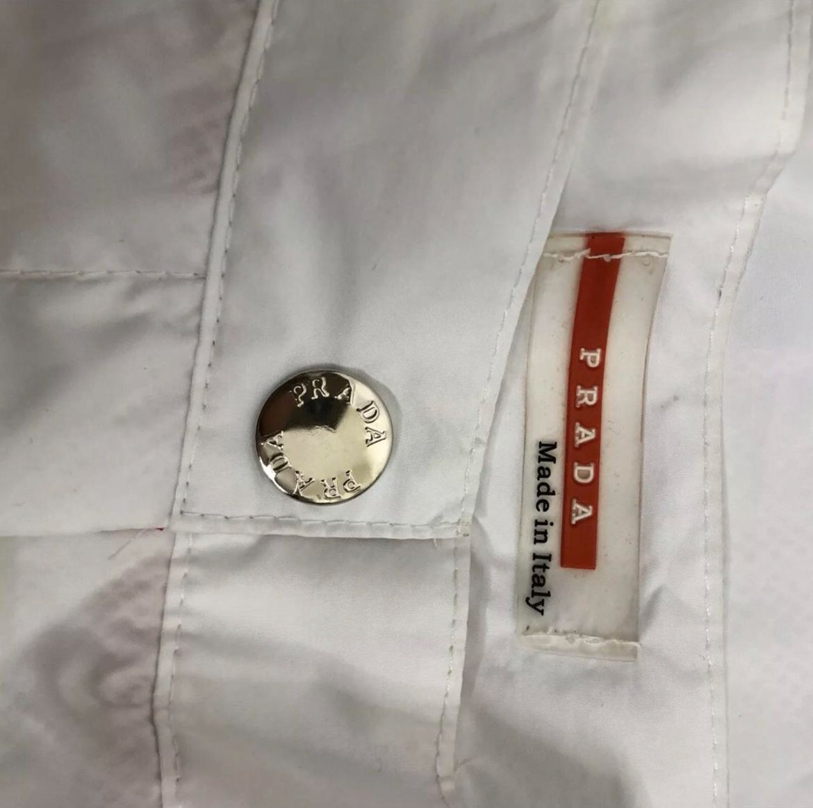 prada red tab pants 28
