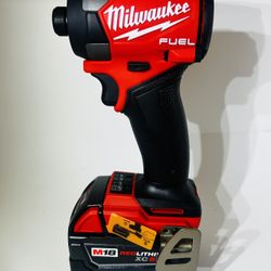 Milwaukee Impact Driver With A 5.0 Battery 