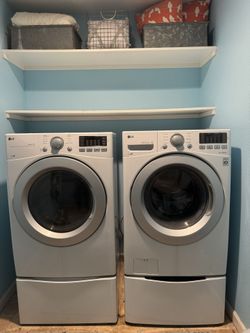 LG Washer And Dryer Set With Pedestals 