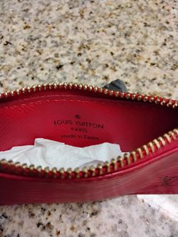 Small deep red Louis Vutton zippered coin purse