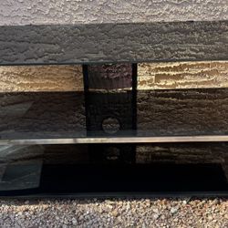 3-tier black glass & chrome TV stand — $50