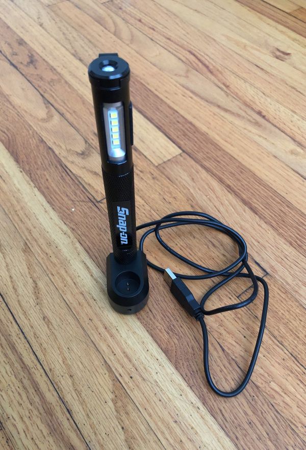 Snap on 25 Lumen rechargeable pen light with dock for Sale in