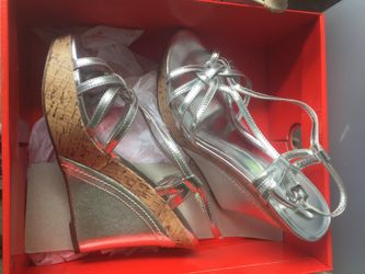 Size 6 silver wedge heels by Charles