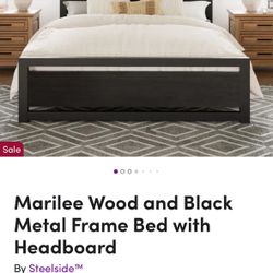 Brand new in box, Queen metal and wood bed frame from Wayfair