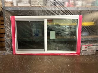 Vinyl retrofit window