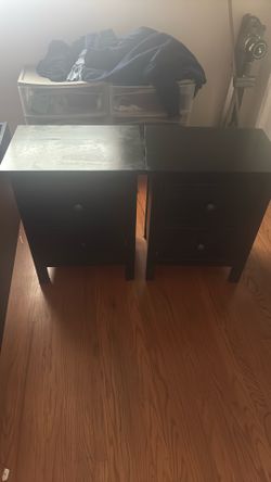 Black IKEA bed with two nightstands