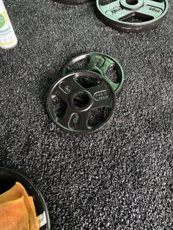 Brand New- Cast Iron Grip Plate sets 5lb pairs- Price for one pair 