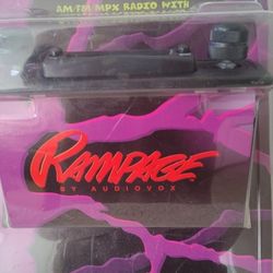 Obo, This vintage item is an Audiovox Rampage K-06563, which is a 1998 model AM/FM/MPX car radio with a stereo cassette player