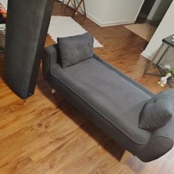 A CUTE LITTLE BLUE SOFA CAN HOLD UP TOO 300 _50 POUNDS 