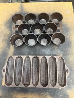 Cast iron Gem muffin pan and cornbread pan.