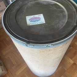 Shipping barrel 55 gallon heavy cardboard with sealable top.