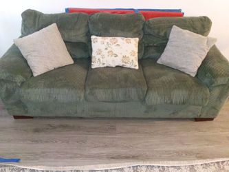 Three seater sofa Olive green suede sofa $150 In great condition.