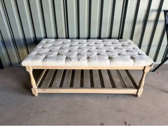 Brown wood upholstered rectangle ottoman coffee table