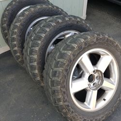 Chevy OEM Rims And Tires 20inch.