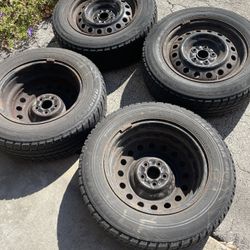 4 Used Bridgestone Blizzak Tires/Steel Wheels