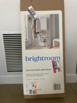Garment rack with mirror
