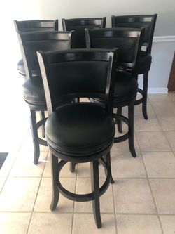 Six black swivel barstools Excellent condition