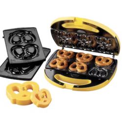 Nostalgia Soft Pretzel Factory Pretzel Maker Makes 2 large or 6 small soft pretzels at 1 time Non-stick coating Includes pretzel cutting tool 3-7 minu