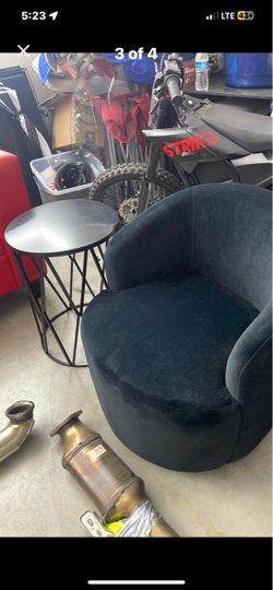 Suede swivel chair and table