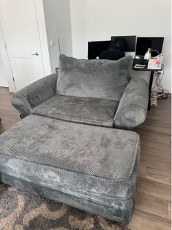 Large chair with footstool
