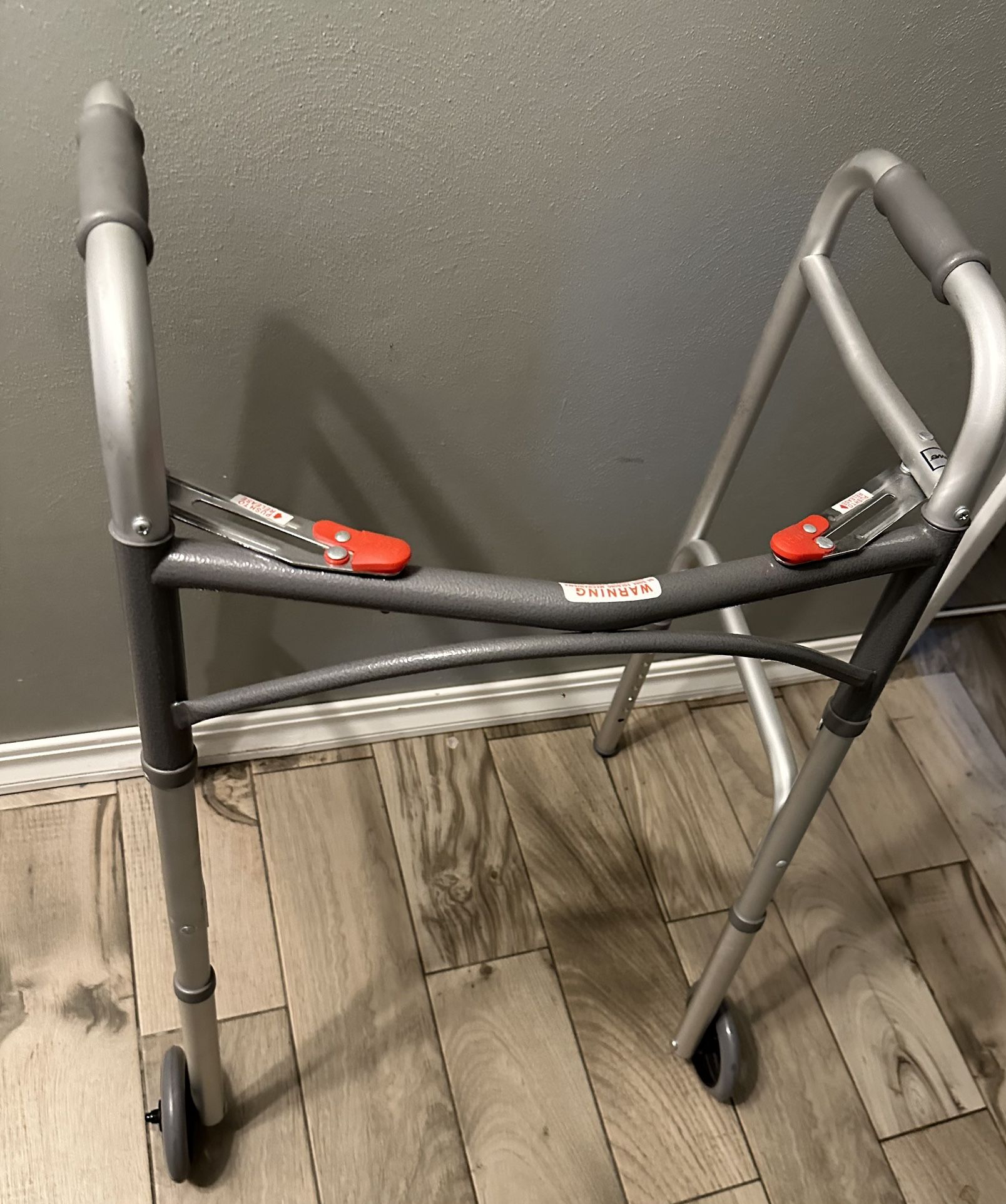 Two Walkers, A Wheelchair And A Cane.