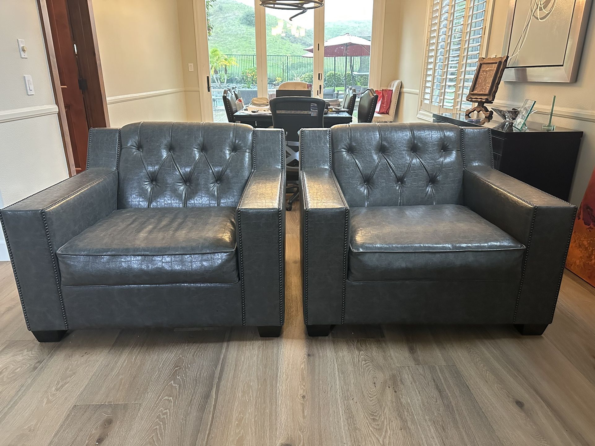 2 Custom Leather Chairs