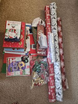 Christmas Supplies - Wrapping paper, boxes, bags, bows, tissue paper, tape.