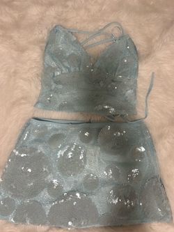 Séquense 2 piece sky blue outfit.