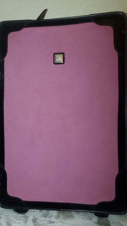 Pink luggage medium