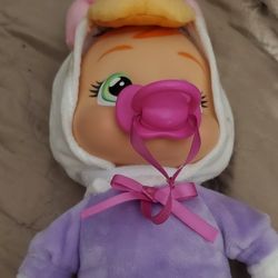 Baby cries.  Dressed like Daisy duck.  Add water and She Cries