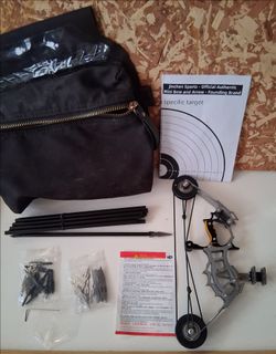 Miniature compound bow w/ arrows.