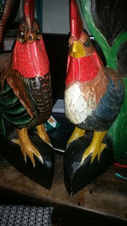 Two beautiful hand carved roosters from Mexico