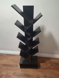 Hey gamers beautiful black shelving for games or CDs.