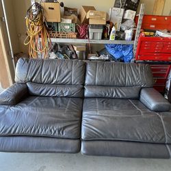 GRAY LEATHER ELECTRONIC RECLINING SOFA & MATCHING RECLINING CHAIR