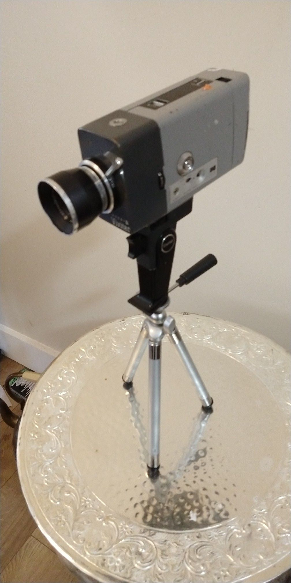 Vintage 8 mm film camera with tripod great display piece