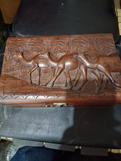 Olive wood hand carved jewelry box with velvet inside .camel carving on face of box