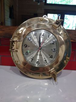 Ships time Brass Port Hole clock