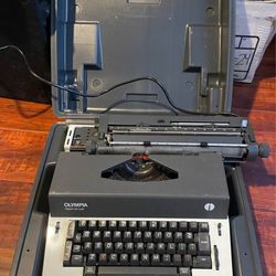 Olympia Report De Lux electric typewriter