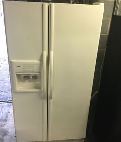 Kenmore side by side refrigerator/ 90 day warranty/ delivery and installation are available