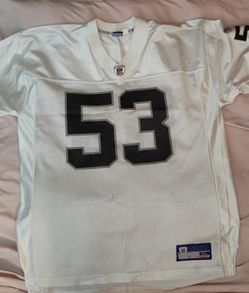 Raiders Romanowski and Rice jerseys