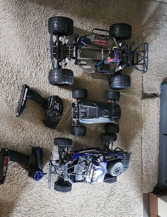 Traxxas mini erevo, Traxxas Slash 4x2 and red cat sand storm.