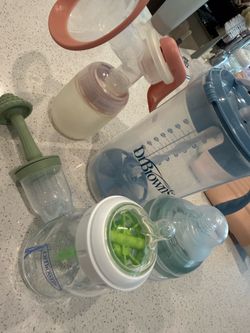 Free Frida Mom pump, baby bottles, and formula pitcher