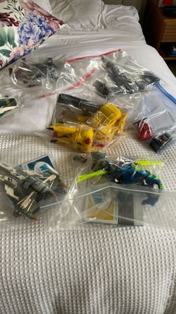 LEGOS of all kinds - a few built w/booklet