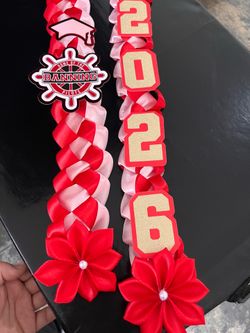 Phineas banning graduation ribbon lei